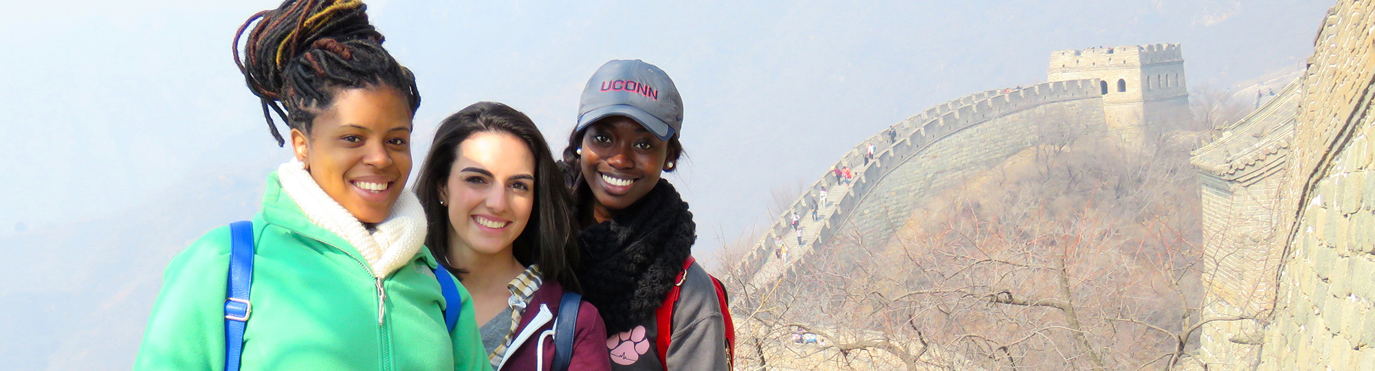sun rising over a foggy uconn field