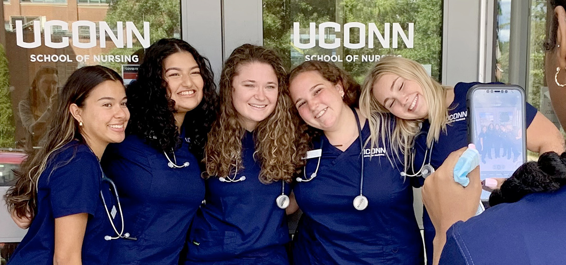 nursing students outside building