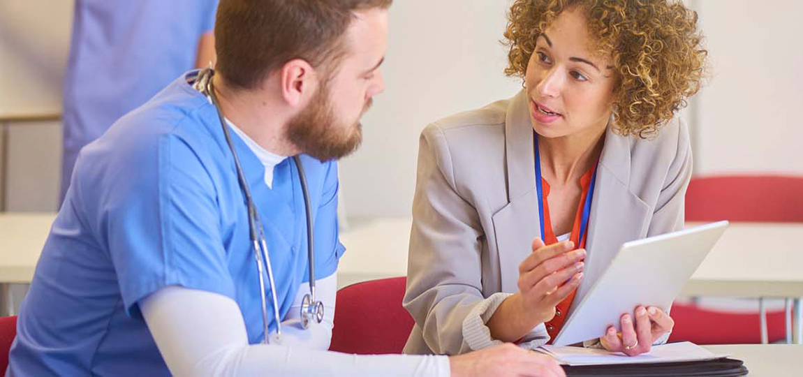 nurses in white coats